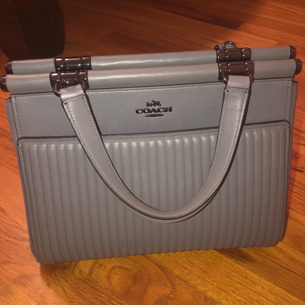 Grey magnet coach purse